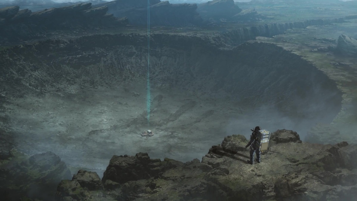 A lone porter overlooking a vast misty crater in the Death Stranding Isolations teaser
